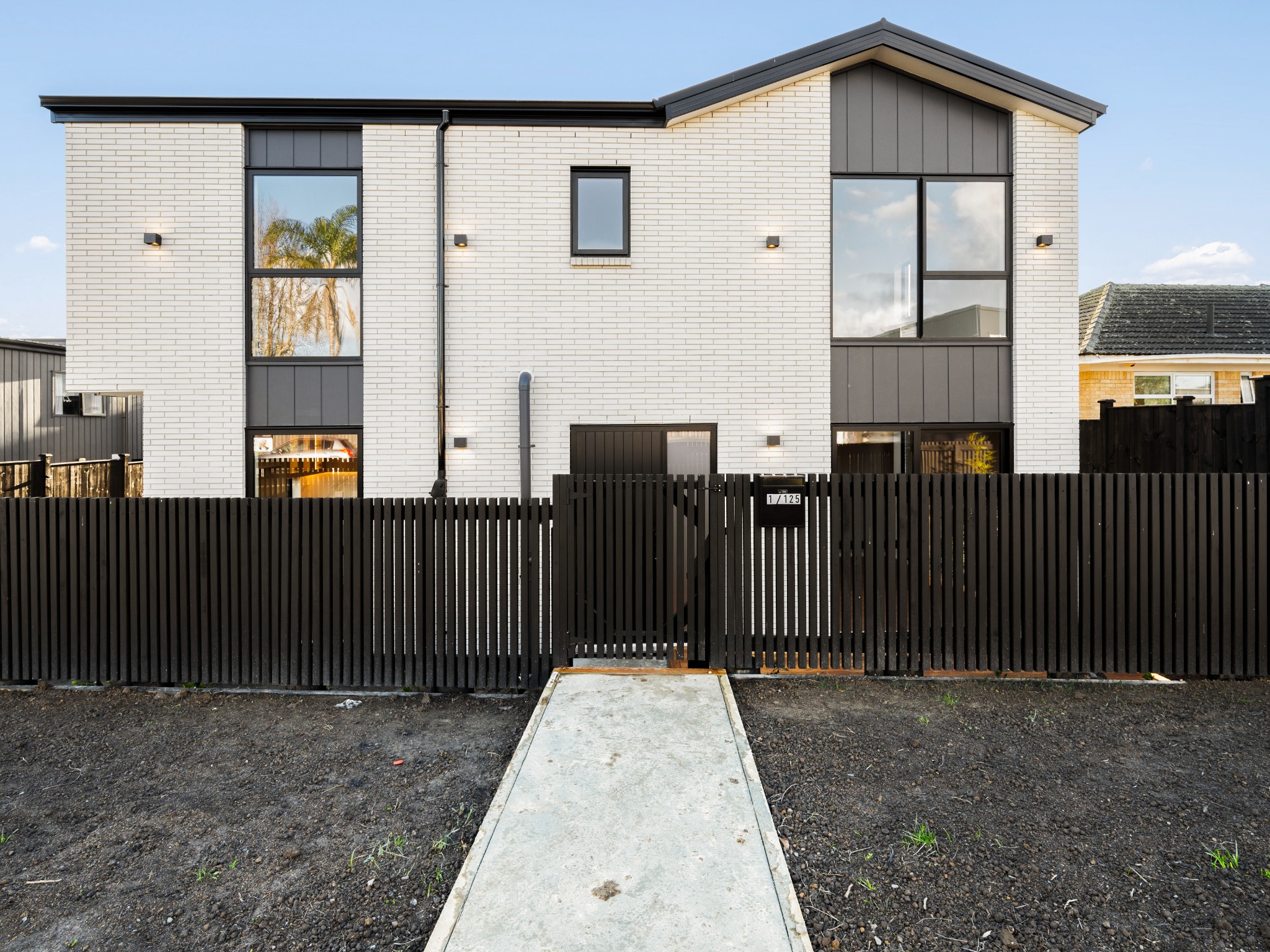 Crisp brick and metal street facade