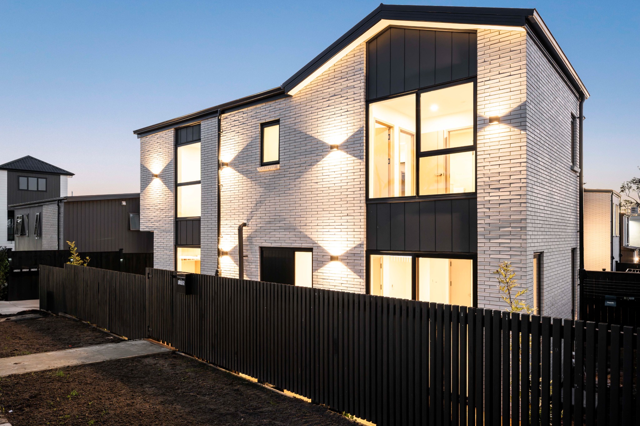 Architectural street elevation at dusk